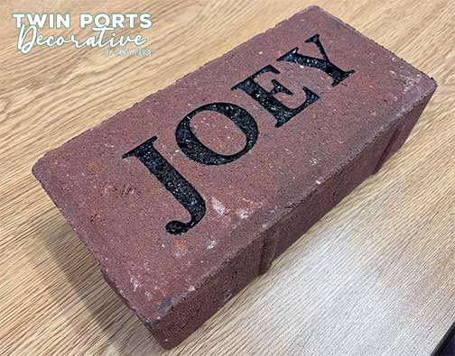 sandblasted and paint filled brick