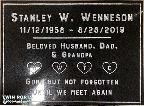sandblasted and paint filled black quartz headstone