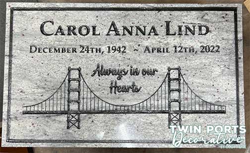 sandblasted and paint filled quartz headstone