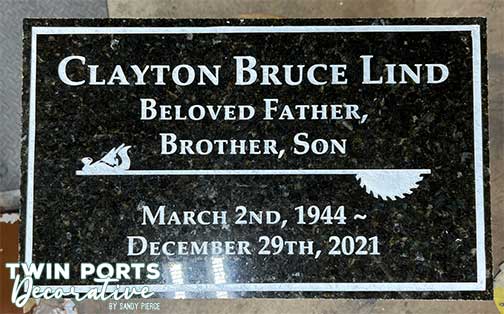 sandblasted and paint filled black quartz headstone