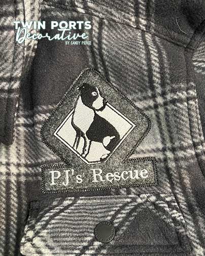 embroidered patch sewn on flannel shacket