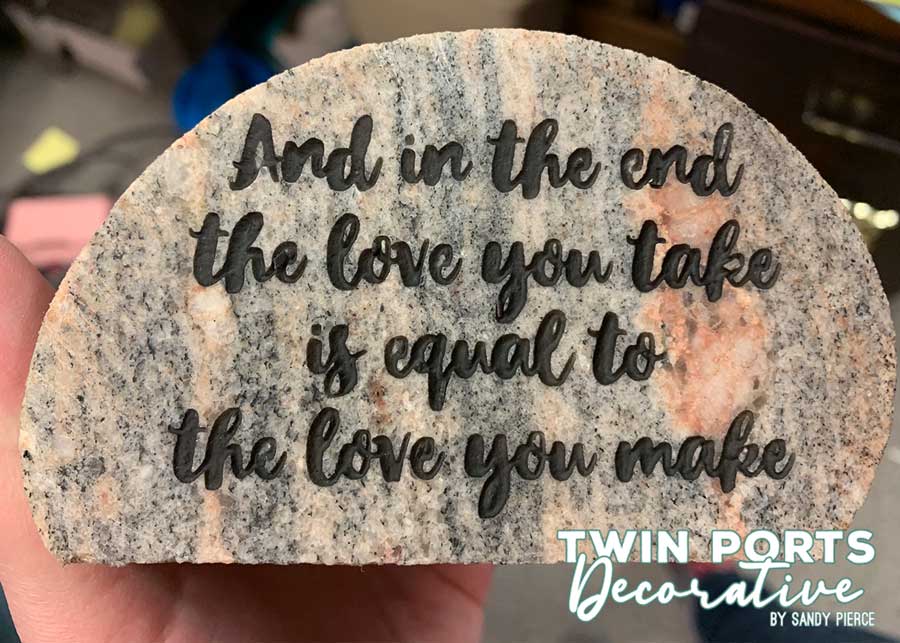 small paperweight size rock sandblasted and paint filled