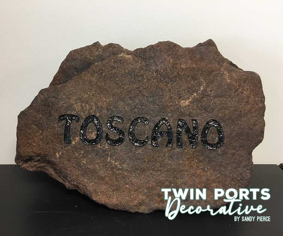 rock sandblasted and paint filled